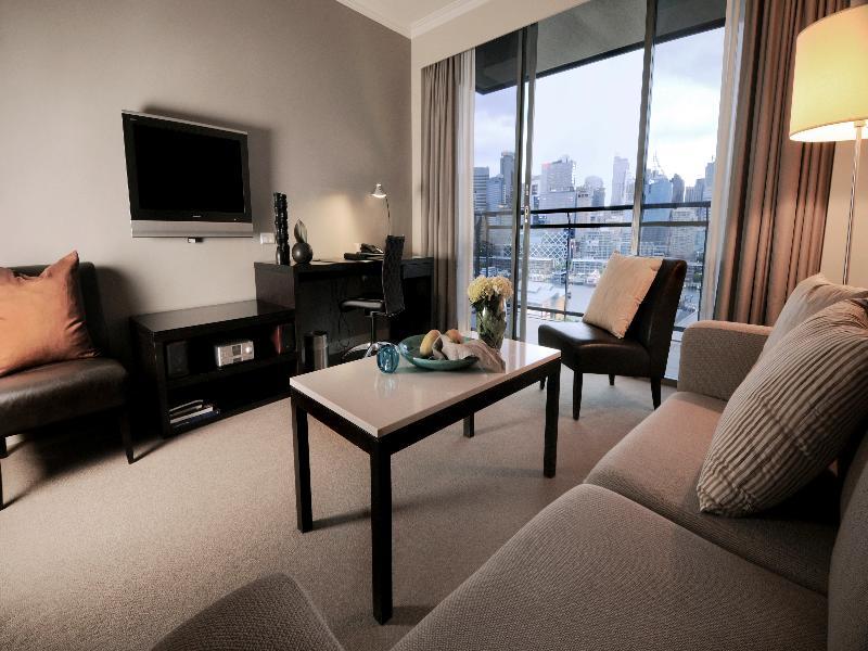 The Star Grand Hotel And Residences Сидней Экстерьер фото A living room in a serviced apartment in Singapore